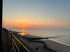 The spectacular sunset (and the moon) from No 1 Cromer Fish & Chip restaurant. Full debrief on bus planning underway!